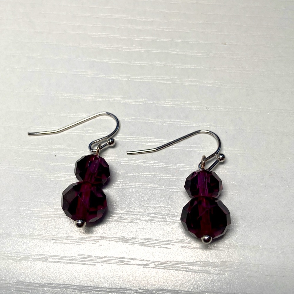 Handmade purple glass earrings.